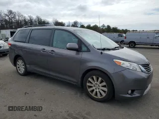 2012 Toyota Sienna XLE with VIN 5TDDK3DC2CS038316, listed as a Copart auction lot 52694245 with 273,415 mi miles and Clean Title. Bid and sale history available at DreamBid. Image 4.