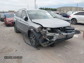 2021 Volkswagen Tiguan S with VIN 3VV1B7AX6MM053907, listed as a IAAI auction lot 41273925 with 109,761 mi miles and . Bid and sale history available at DreamBid. Image 1.