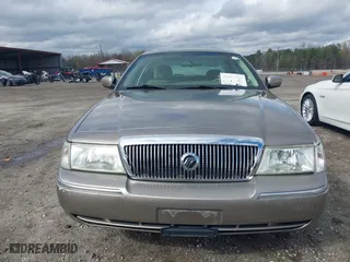 2005 Mercury Grand Marquis GS with VIN 2MEFM74W55X603152, listed as a IAAI auction lot 41872534 with 84,290 mi miles. Bid and sale history available at carsss.com. Image 12.