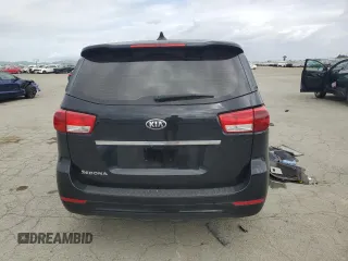 2016 Kia Sedona L with VIN KNDMA5C10G6184184, listed as a Copart auction lot 50974325 with 144,549 mi miles and Salvage Title. Bid and sale history available at carsss.com. Image 6.