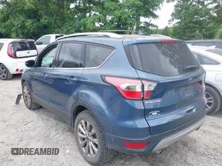 2018 Ford Escape Titanium with VIN 1FMCU0J99JUA12717, listed as a IAAI auction lot 42237509 with 123,896 mi miles and . Bid and sale history available at DreamBid. Image 14.