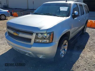 2014 Chevrolet Suburban LT with VIN 1GNSCJE06ER105294, listed as a IAAI auction lot 41687882 with 200,698 mi miles. Bid and sale history available at carsss.com. Image 6.