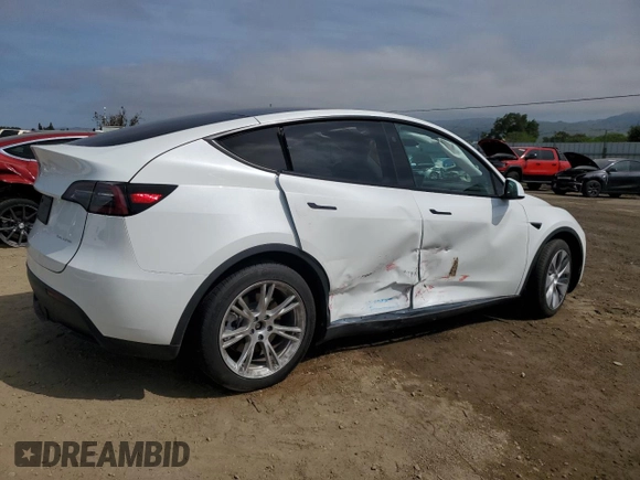 2023 Tesla Model Y Long Range z VIN 7SAYGDEE3PF815088, wystawiony jako Copart lot #54849895 z przebiegiem 19 637 mil mil oraz Szkoda całkowita • Salvage title. Historia ofert i sprzedaży dostępna na DreamBid. Obrazek 3.