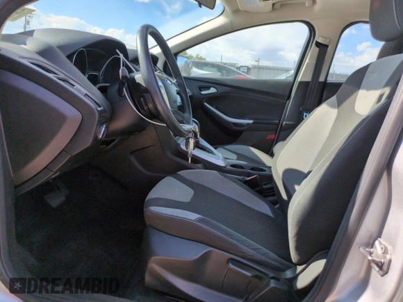 2012 Ford Focus SE with VIN 1FAHP3F25CL329102, listed as a Copart auction lot 65479965 with 83,774 mi miles and Clean title. Bid and sale history available at DreamBid. Image 7.