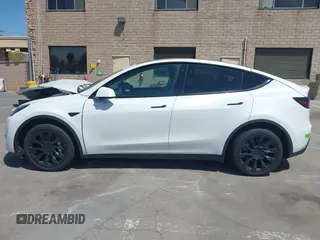 2023 Tesla Model Y Long Range with VIN 7SAYGDEE8PF612438, listed as a IAAI auction lot 41991145 with 29,775 mi miles and . Bid and sale history available at carsss.com. Image 14.