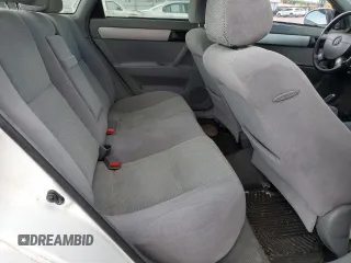 2006 Suzuki Forenza z VIN KL5JD56Z86K350488, wystawiony jako Copart lot #67422784 z przebiegiem 125 251 mil mil oraz Tytuł czysty. Historia ofert i sprzedaży dostępna na DreamBid. Obrazek 10.