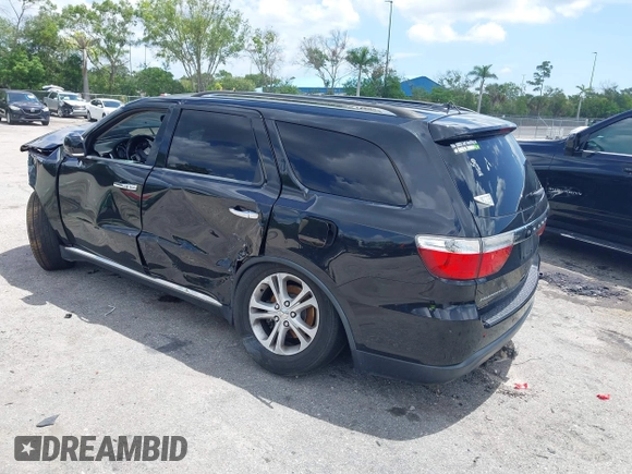 2013 Dodge Durango Crew with VIN 1C4RDHDG9DC684746, listed as a IAAI auction lot 42473302 with 122,602 mi miles and . Bid and sale history available at DreamBid. Image 3.