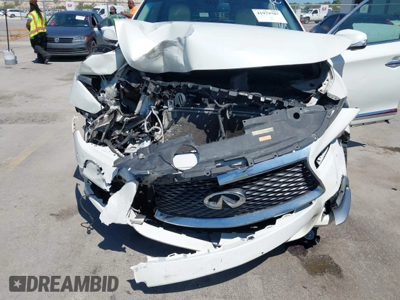 2016 Infiniti QX60 with VIN 5N1AL0MMXGC511972, listed as a IAAI auction lot 41979787 with 127,298 mi miles and . Bid and sale history available at DreamBid. Image 6.