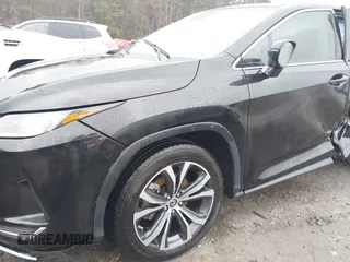 2021 Lexus RX with VIN 2T2HZMAA0MC201749, listed as a IAAI auction lot 41426758 with 148,064 mi miles. Bid and sale history available at carsss.com. Image 17.