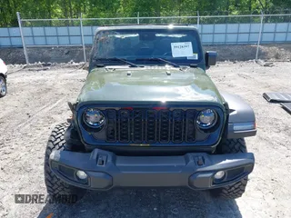 2024 Jeep Wrangler Willys with VIN 1C4PJXDG8RW236725, listed as a IAAI auction lot 39128397 with 50 mi miles and . Bid and sale history available at DreamBid. Image 13.