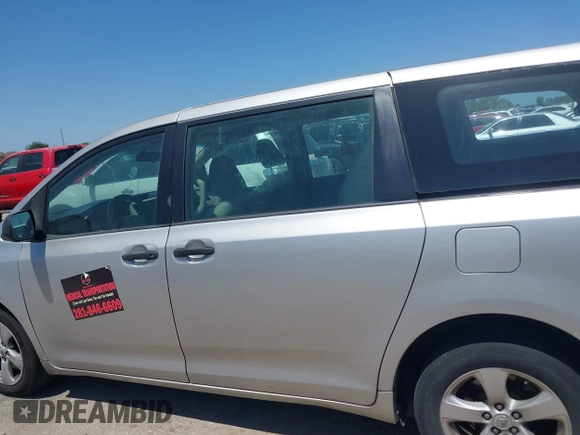 2014 Toyota Sienna L with VIN 5TDZK3DC1ES410012, listed as a IAAI auction lot 42005001 with 440,789 mi miles. Bid and sale history available at carsss.com. Image 14.