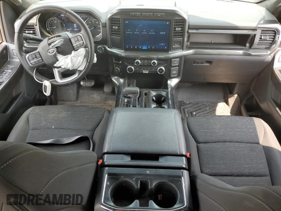 2023 Ford F-150 XL with VIN 1FTEW1EP7PFB66555, listed as a Copart auction lot 59384665 with 28,495 mi miles and Salvage title. Bid and sale history available at DreamBid. Image 8.