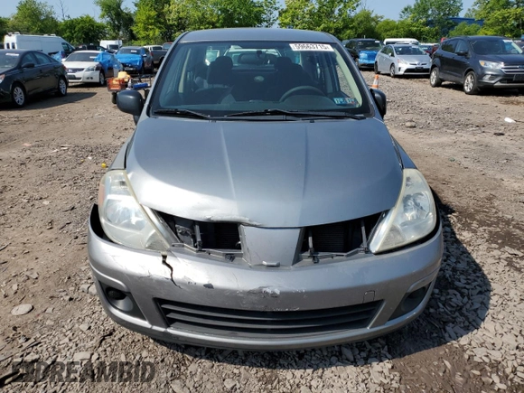 2007 Nissan Versa SL z VIN 3N1BC11E77L451507, wystawiony jako Copart lot #59663715 z przebiegiem 132 363 mil mil oraz Szkoda całkowita • Salvage title. Historia ofert i sprzedaży dostępna na DreamBid. Obrazek 5.
