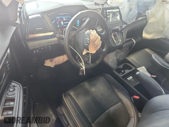 2023 Honda Odyssey Elite with VIN 5FNRL6H90PB071988, listed as a Copart auction lot 58589585 with 12,998 mi miles and Salvage title. Bid and sale history available at DreamBid. Image 8.