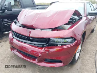 2023 Dodge Charger SXT with VIN 2C3CDXBG9PH659726, listed as a IAAI auction lot 42103636 with 14,321 mi miles and . Bid and sale history available at DreamBid. Image 6.