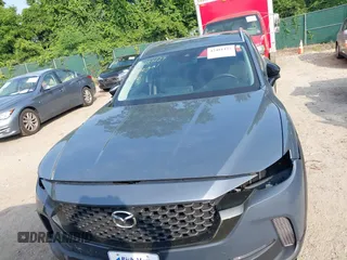 2024 Mazda CX-50 S Premium z VIN 7MMVABDM7RN231991, wystawiony jako IAAI lot #42481427 z przebiegiem 7 843 mil mil oraz . Historia ofert i sprzedaży dostępna na DreamBid. Obrazek 13.