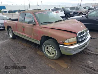 1999 Dodge Dakota SLT z VIN 1B7GL22XXXS173969, wystawiony jako IAAI lot #42323610 z przebiegiem Nie podano mil oraz . Historia ofert i sprzedaży dostępna na DreamBid. Obrazek 1.