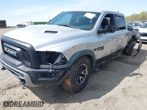 2015 Ram 1500 Rebel z VIN 1C6RR7YT0FS751334, wystawiony jako IAAI lot #41933040 z przebiegiem 167 336 mil mil oraz . Historia ofert i sprzedaży dostępna na DreamBid. Obrazek 2.
