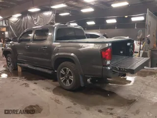 2018 Toyota Tacoma SR with VIN 3TMCZ5AN9JM135891, listed as a IAAI auction lot 41551990 with 80,235 mi miles. Bid and sale history available at carsss.com. Image 3.