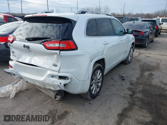 2018 Jeep Cherokee Overland with VIN 1C4PJMJX7JD594319, listed as a IAAI auction lot 41177860 with 128,925 mi miles. Bid and sale history available at carsss.com. Image 4.