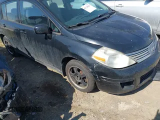 2009 Nissan Versa 1.8 SL with VIN 3N1BC13E19L497981, listed as a IAAI auction lot 41716561 with 176,722 mi miles. Bid and sale history available at carsss.com. Image 1.
