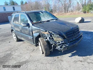 2003 Mercedes-Benz M-Class 3.7L with VIN 4JGAB57E23A450868, listed as a IAAI auction lot 41983681 with 125,468 mi miles. Bid and sale history available at carsss.com. Image 6.