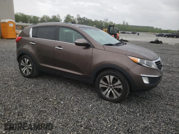 2011 Kia Sportage EX with VIN KNDPC3A2XB7080957, listed as a Copart auction lot 54665855 with 191,076 mi miles and Salvage title. Bid and sale history available at DreamBid. Image 4.