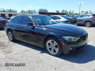 2016 BMW 3 Series 328i with VIN WBA8E9G57GNT84959, listed as a IAAI auction lot 41699987 with 74,010 mi miles. Bid and sale history available at carsss.com. Image 1.