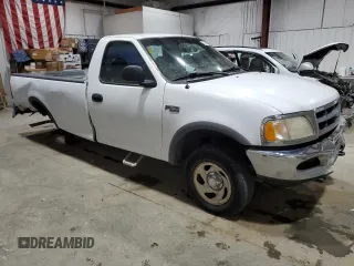 1997 Ford F-150 z VIN 1FTDF18W4VKD41606, wystawiony jako Copart lot #83808524 z przebiegiem 173 675 mil mil oraz Czysty tytuł • Clean title. Historia ofert i sprzedaży dostępna na DreamBid. Obrazek 4.