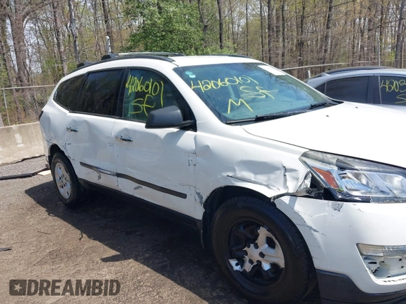 2015 Chevrolet Traverse LS z VIN 1GNKVFED8FJ257149, wystawiony jako IAAI lot #42060101 z przebiegiem 150 738 mil mil oraz . Historia ofert i sprzedaży dostępna na DreamBid. Obrazek 6.
