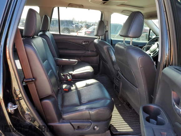 2019 Honda Pilot Touring 7-Passenger z VIN 5FNYF5H69KB019903, wystawiony jako Copart lot #43598805 z przebiegiem 144 486 mil mil oraz Szkoda całkowita • Salvage title. Historia ofert i sprzedaży dostępna na DreamBid. Obrazek 11.