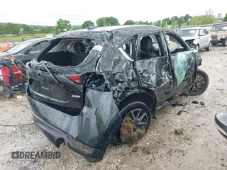 2018 Mazda CX-5 Grand Touring z VIN JM3KFADM8J0325157, wystawiony jako IAAI lot #42214750 z przebiegiem Nie podano mil oraz . Historia ofert i sprzedaży dostępna na DreamBid. Obrazek 4.