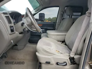 2006 Dodge 1500 SLT z VIN 1D7HU18226S669733, wystawiony jako Copart lot #55410335 z przebiegiem 143 781 mil mil oraz Szkoda całkowita • Salvage title. Historia ofert i sprzedaży dostępna na DreamBid. Obrazek 7.