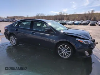 2014 Toyota Avalon Limited with VIN 4T1BK1EB5EU111304, listed as a Copart auction lot 52227635 with 133,805 mi miles and Salvage Title. Bid and sale history available at carsss.com. Image 4.