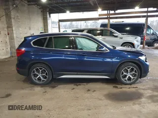2019 BMW X1 xDrive28i with VIN WBXHT3C55K5L37338, listed as a IAAI auction lot 41934461 with 87,913 mi miles. Bid and sale history available at carsss.com. Image 13.