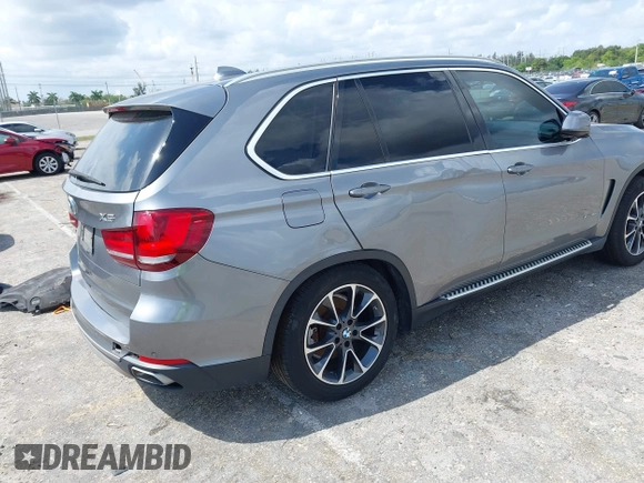 2016 BMW X5 xDrive40e with VIN 5UXKT0C58G0S75938, listed as a IAAI auction lot 42021138 with 97,426 mi miles and . Bid and sale history available at DreamBid. Image 4.