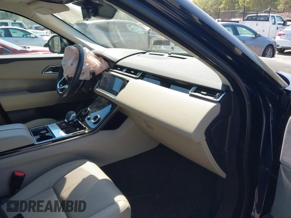 2021 Land Rover Range Rover Velar S z VIN SALYJ2EXXMA302793, wystawiony jako IAAI lot #42234683 z przebiegiem 32 776 mil mil oraz . Historia ofert i sprzedaży dostępna na DreamBid. Obrazek 5.