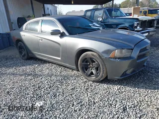 2012 Dodge Charger Police with VIN 2C3CDXAT1CH287971, listed as a IAAI auction lot 41473213 with 242,333 mi miles. Bid and sale history available at carsss.com. Image 1.