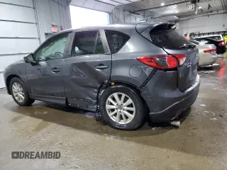 2014 Mazda CX-5 Touring with VIN JM3KE4CY6E0421738, listed as a Copart auction lot 45888885 with 103,693 mi miles and Salvage Title. Bid and sale history available at carsss.com. Image 2.