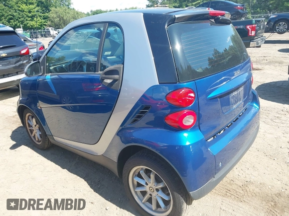 2009 Smart fortwo Pure with VIN WMEEJ31X79K210162, listed as a IAAI auction lot 42715203 with 95,089 mi miles and . Bid and sale history available at DreamBid. Image 3.