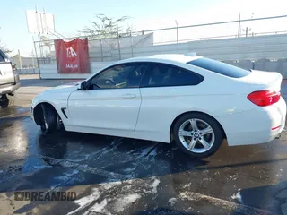 2014 BMW 4 Series 428i with VIN WBA3N7C50EF718812, listed as a IAAI auction lot 41349128 with 67,581 mi miles and . Bid and sale history available at carsss.com. Image 14.