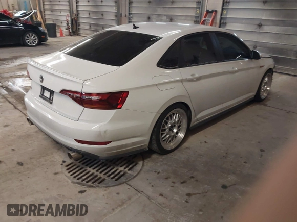 2019 Volkswagen Jetta GLI S with VIN 3VW5T7BU6KM261054, listed as a IAAI auction lot 40956960 with 56,784 mi miles and . Bid and sale history available at DreamBid. Image 4.