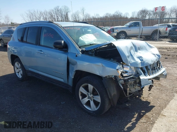 2013 Jeep Compass Latitude with VIN 1C4NJDEB2DD263920, listed as a IAAI auction lot 41832542 with 128,018 mi miles. Bid and sale history available at carsss.com. Image 1.
