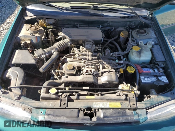 1997 Subaru Impreza L with VIN JF1GF4352VG821519, listed as a Copart auction lot 76420034 with 57,600 mi miles and Clean title. Bid and sale history available at DreamBid. Image 12.