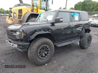 2023 Ford Bronco Raptor with VIN 1FMEE5JR9PLB23222, listed as a IAAI auction lot 42376438 with 7,447 mi miles and . Bid and sale history available at DreamBid. Image 2.