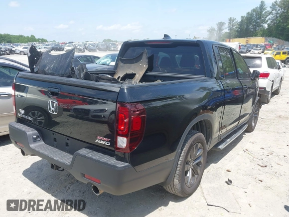 2021 Honda Ridgeline Sport with VIN 5FPYK3F15MB026171, listed as a IAAI auction lot 42265057 with 92,981 mi miles and . Bid and sale history available at DreamBid. Image 4.