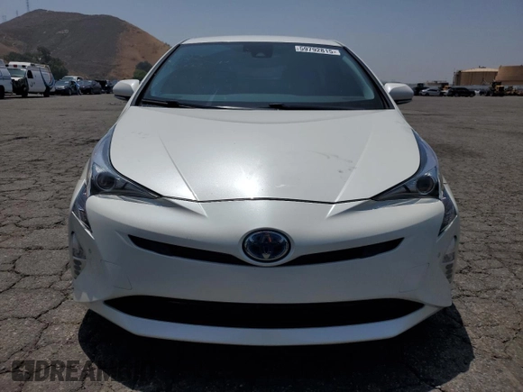 2016 Toyota Prius Four с VIN JTDKARFUXG3020768, выставлен на аукционе Copart как лот 59792815 с пробегом 112 635 миль миль и Списание • Salvage title. История ставок и продаж доступна на DreamBid. Изображение 5.
