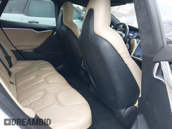 2016 Tesla Model S 90D with VIN 5YJSA1E26GF155962, listed as a IAAI auction lot 41348998 with 134,269 mi miles and . Bid and sale history available at DreamBid. Image 8.
