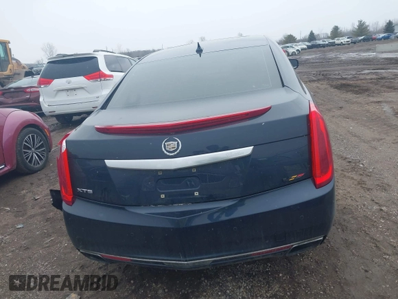 2013 Cadillac XTS Luxury with VIN 2G61P5S32D9196946, listed as a IAAI auction lot 41732441 with 110,380 mi miles. Bid and sale history available at carsss.com. Image 16.