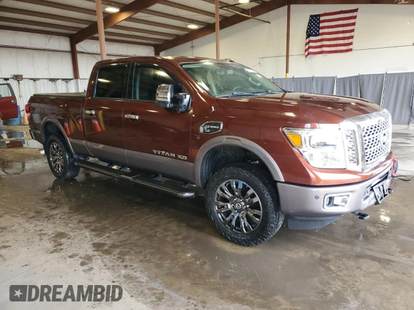 2016 Nissan Titan Platinum Reserve with VIN 1N6BA1F45GN507363, listed as a Copart auction lot 53625635 with 95,450 mi miles and Salvage title. Bid and sale history available at DreamBid. Image 4.